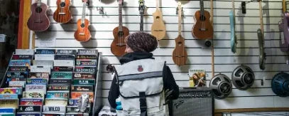 Banjo Brothers Metro Backpack on Female in Guitar Shop