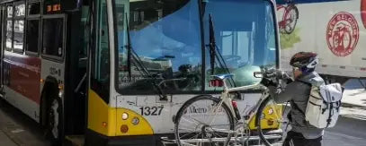 Backpack Pannier Rider Putting Bike On Bus Banjo Brothers